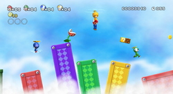 E3 2009 screenshot of the characters in their Propeller Suits in New Super Mario Bros. Wii.