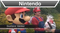 Nintendo 3DS - Mario Delivers a Holiday Gift to a Fan.jpg
