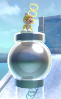 Cat Mario standing atop a Clear Pipe Cannon in the Bowser's Fury campaign of Super Mario 3D World + Bowser's Fury