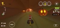Toad (Party Time) near two Jack-o'-lanterns in Wii Maple Treeway during the 2020 Halloween Tour