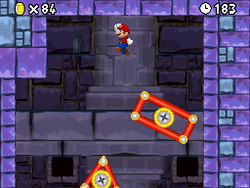 Mario using the moving platforms in 2-Tower