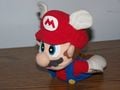 A plushie of Mario with a Wing Cap based on Super Mario 64