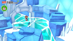 Mario standing before the slide containing 41 Coins on Ice Vellumental Mountain of The Origami King.