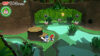 Mario in a jungle with origami Ptooies in Paper Mario: The Origami King