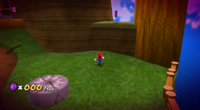 Mario approaching a ledge in Honeyhive Galaxy to grab a Purple Coin.