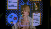 Scene from Dr. Giggles showing a boy playing Dr. Mario.