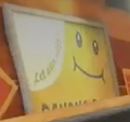 A billboard showing the logo in Mario Kart World