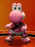 Image of Yoshi in a pink uniform, from Mario Strikers: Battle League