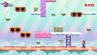 Screenshot of Merry Mini-Land's bonus level from the Nintendo Switch version of Mario vs. Donkey Kong