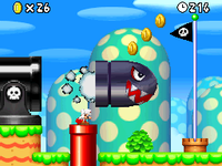 Mario tries to duck under a Banzai Bill in New Super Mario Bros.