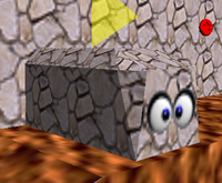 Screenshot of a Bomp from Super Mario 64.