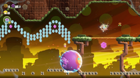 The third 10-flower coin in Pipe-Rock Plateau Special Bounce, Bounce, Bounce in Super Mario Bros. Wonder