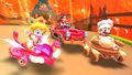 Baby Peach (Cherub), Pauline (Rose), and Mario (Chef) driving on the course