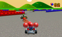 Mario participates in a Balloon Battle in Battle Course 1 (GBA) from Mario Kart 7.