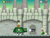 Fire Luigi fighting Monty Tank in World 6-Castle