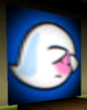 A painting of a Boo hiding its face in Super Mario 64