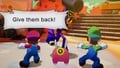 Ten about to battle Mario and Luigi again after they pick up his dropped Battle Plugs and Power Tap