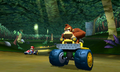 A screenshot of Donkey Kong with his Bolt Buggy in DK Jungle