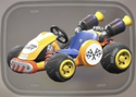 The orange/red-orange Standard Kart from Mario Kart World