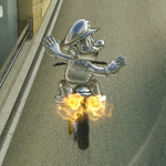 Metal Mario performing a trick in Mario Kart 8.