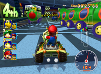 Mario and Bowser are between two Wiggler Wagons in Mushroom City, from an early version of Mario Kart: Double Dash!!.