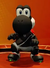 Image of Yoshi in a black uniform, from Mario Strikers: Battle League