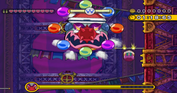 A screenshot of Wario fighting Chortlebot.