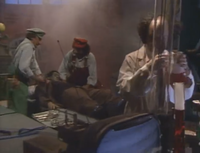 Mario and Luigi helping Dr. Frankenstein prepare his monster's brain transfusion in The Super Mario Bros. Super Show!