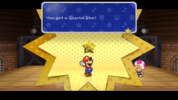 Mario getting the Gold Star in Glitz Pit of Paper Mario: The Thousand-Year Door for Nintendo Switch.