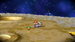 Mario after destroying the rock containing a Maple Syrup on the Moon of Paper Mario: The Thousand-Year Door for Nintendo Switch.