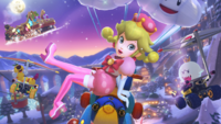 Peachette in her biker suit performing a trick on the Teddy Buggy with Roller tires and a Cloud Glider in Merry Mountain in Mario Kart 8 Deluxe. King Boo and Wiggler appear alongside in the image.