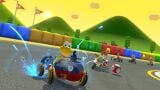 Koopa Troopa and others driving SNES Mario Circuit 3