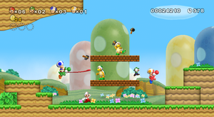 Early screenshot of Mario, Luigi, Blue Toad and Yellow Toad in World 1-3 of New Super Mario Bros. Wii. Note the Red Yoshi.