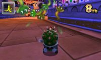 Screenshot of green snakes coming out of snake jars, in Mario Kart 7