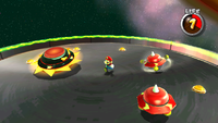 Mario in a boss fight against Topmaniac in Super Mario Galaxy.