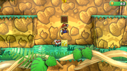 Mario revealing a hidden Coin ? Block in Keelhaul Key, in the remake of the Paper Mario: The Thousand-Year Door for the Nintendo Switch.