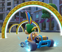 Thumbnail of the Mii Cup challenge from the 2023 Summer Tour; a Ring Race challenge set on Madrid Drive