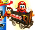 Diddy Kong pushing a minecart with Mario riding in it as seen in the German GamePro magazine
