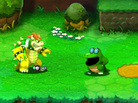 Screenshot of Bowser having his defense increased in Mario & Luigi: Bowser's Inside Story + Bowser Jr.'s Journey