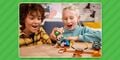 Children playing with the Luigi's Mansion Lab and Poltergust Expansion Set