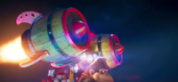 Donkey Kong fires one of the Rocket Barrels from his kart to destroy the Koopa General's bulldozer as it approaches