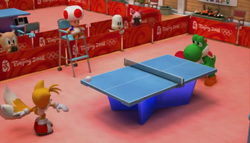 Toad refereeing Yoshi and Tails competing in Singles in the opening of Mario & Sonic at the Olympic Games for Wii