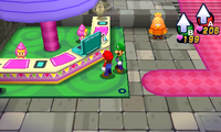 A Nintendo 3DS at Pi'illo Castle's castle-info kiosk in Mario & Luigi: Dream Team