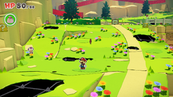 Mario standing near two holes containing a group of coins in Picnic Road of The Origami King.