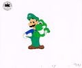 Unused animation cel of Luigi holding Baby Yoshi. (This would have been used when Luigi asked Baby Yoshi if he was hungry. He would reach into his pocket to get something to give to Baby Yoshi but he does not have anything to give him.)