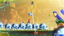 A herd of Bulrushes charging into a Goal Pole in Super Mario Bros. Wonder
