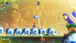 A Wonder Bulrush herd charging into a Goal Pole in Super Mario Bros. Wonder