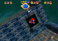 Mario swimming into the entrance of the sunken ship