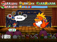 Mario and his partners battling Macho Grubba.