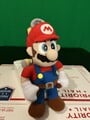 A plushie of Mario and F.L.U.D.D. from Super Mario Sunshine by BD&A